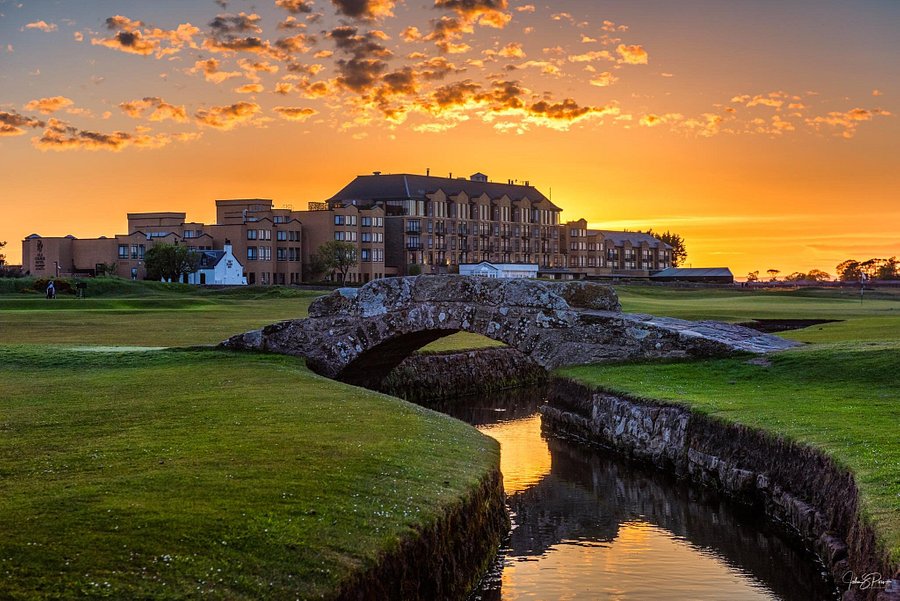 Old Course Hotel and The Swilcan Bridge during sunset